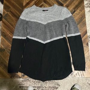 Kids size medium 10 through 12, gray and black striped sweater